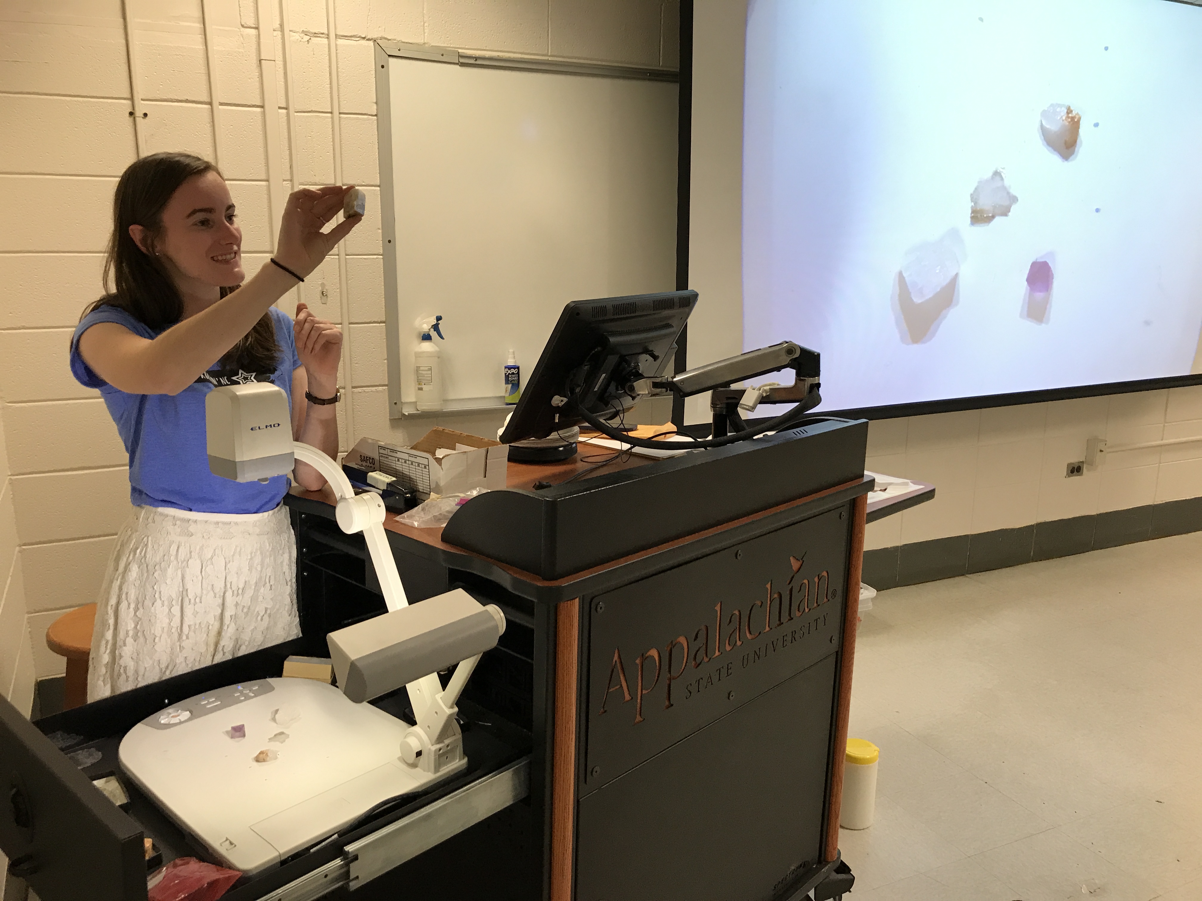 Geology student Annie Klyce goes over mineral identification
