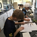 Students learning in the Department's mobile laboratory